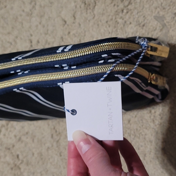 FREE TARTAN AND TWINE COSMETICS BAG WITH ANY BEAUTY PURCHASE OF $50 OR MORE - Picture 2 of 3